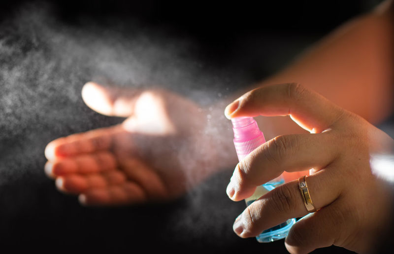 Close-up of woman holding hands