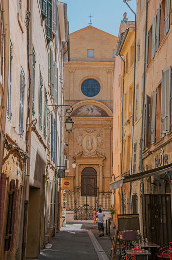 Alley with church in the background at aix-en-provence, in the french provence.