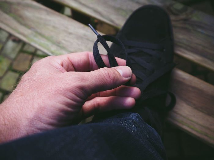 Close-up of man holding hands
