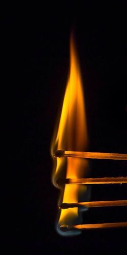 Close-up of burning matches