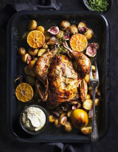 Roasted chicken in baking tray