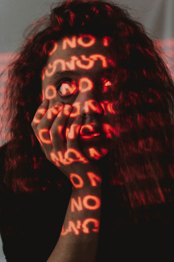 Close-up portrait of woman with text