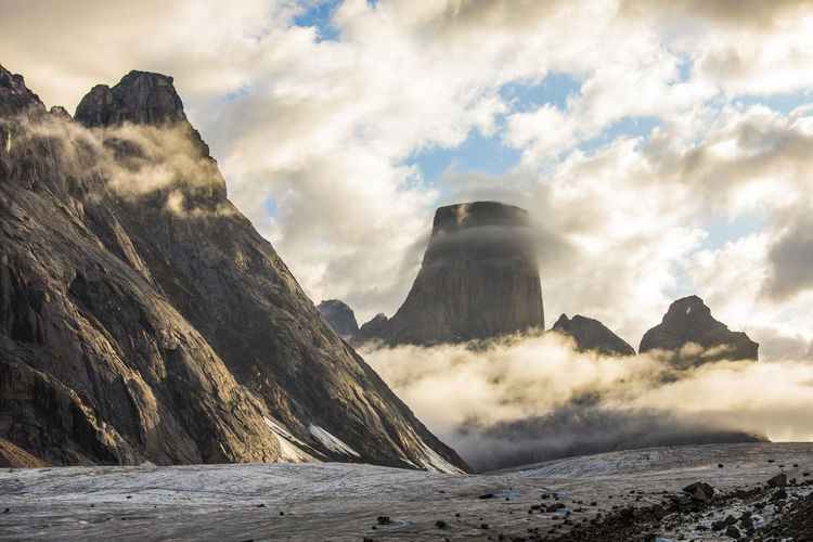 Cloud circles mount asgard, auyuittuq national park, baffin island.