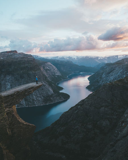 Scenic view of valley against sky during sunset