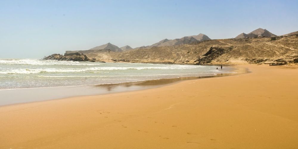 Scenic view of sunny beach in pakistan