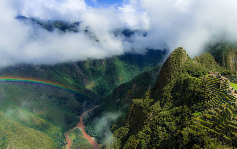 Scenic view of clouds covering mountains