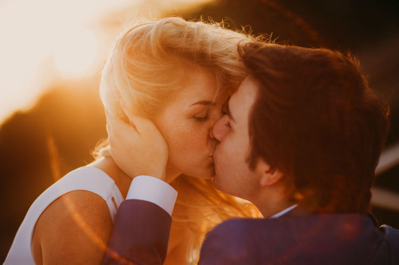 Close-up portrait of couple kissing