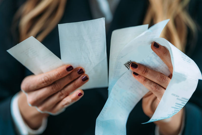 Inflation rising, costs increasing. business woman holding rising costs