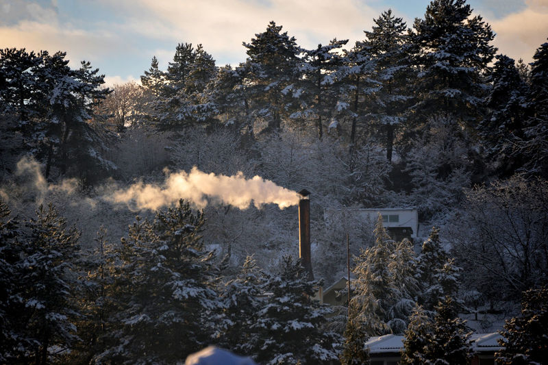 Air pollution image of chimney and smoke in winter