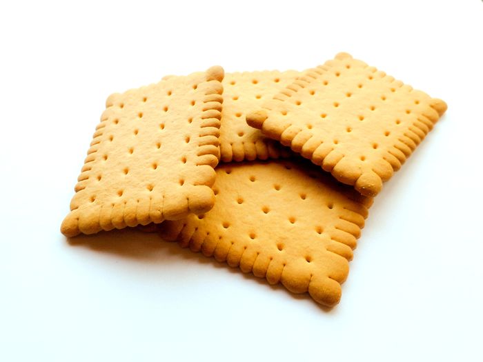 Close-up of biscuits on white background