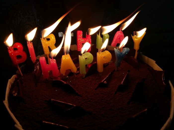 High angle view of candles on birthday cake