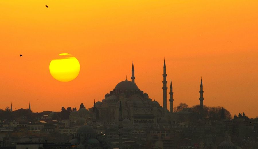 View of mosque at sunset