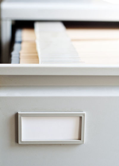 Close-up of filing cabinet in office