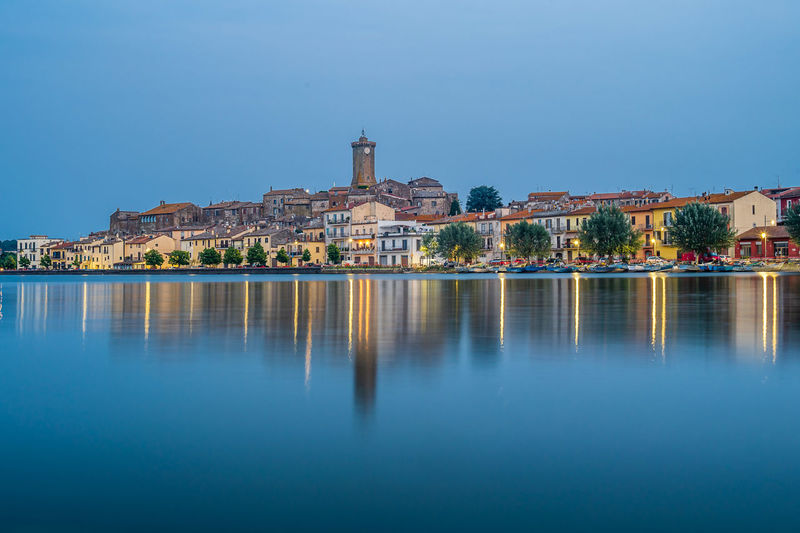 The townscape of the ancient village of marta, on the shore of the bolsena lake in italy