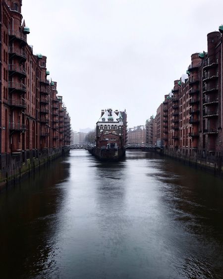 View of buildings in city against sky