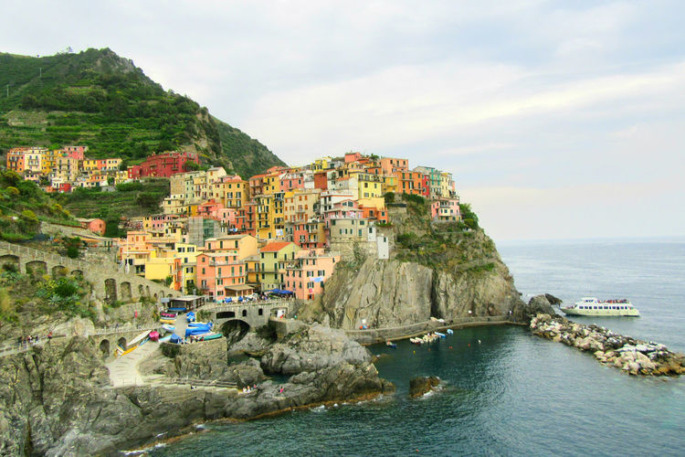 Idyllic houses on shore in manarola
