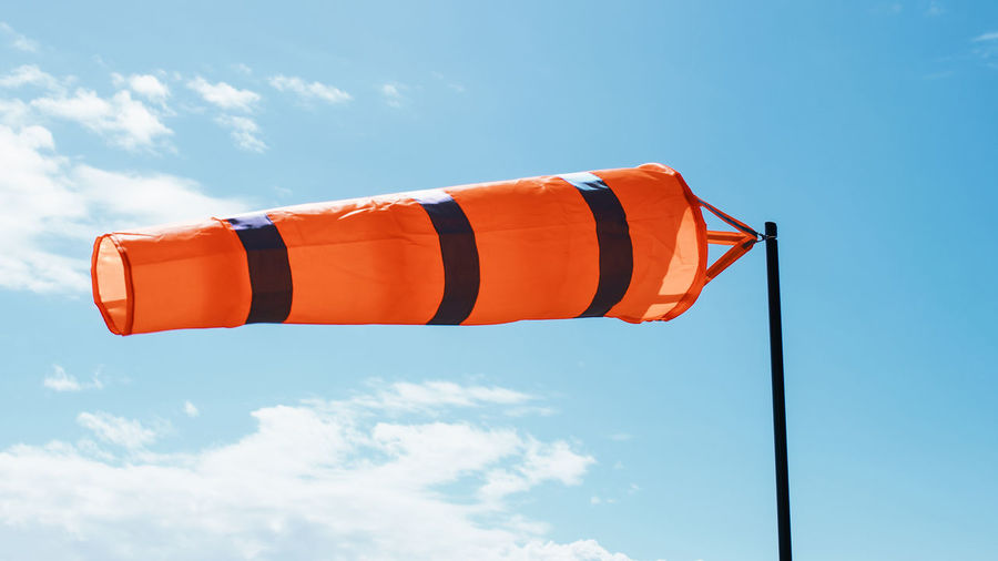 Windsock with blue sky on background
