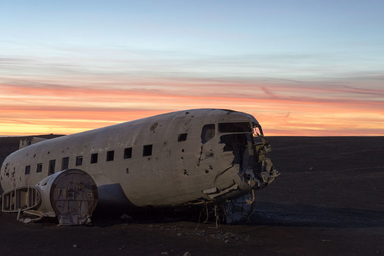 Abandoned airplane on beach
