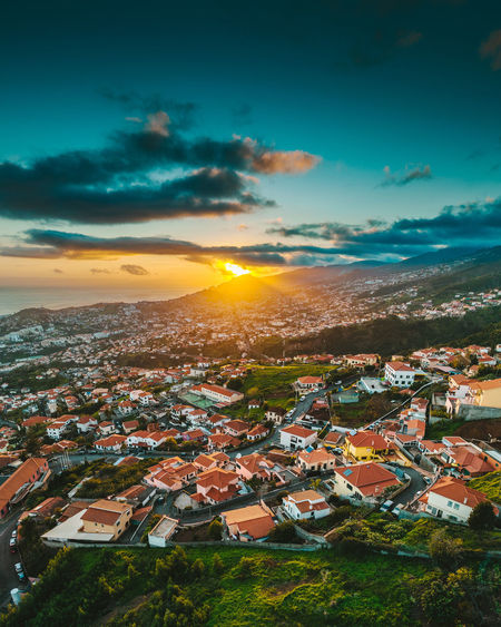 Funchal city, madeira island, portugal. spring sunset time. drone aerial view.