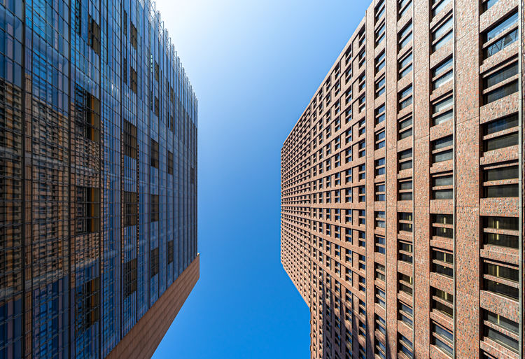 Low angle view of buildings against clear sky