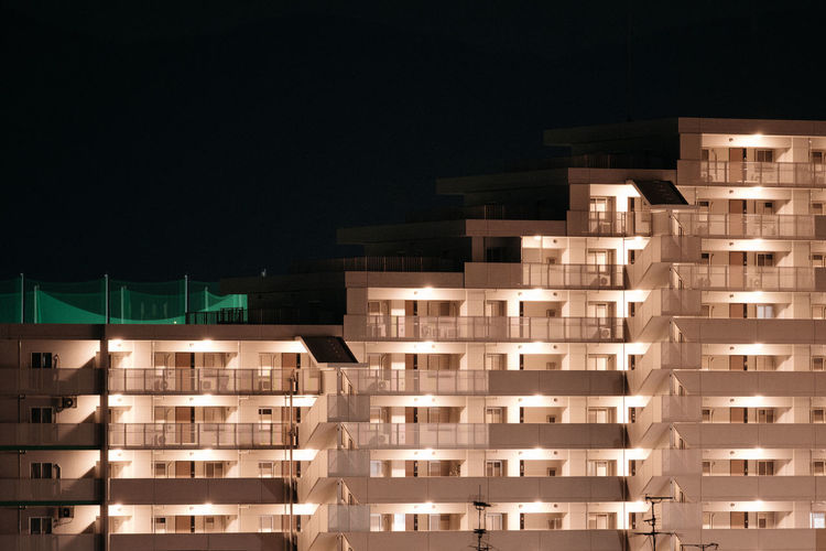View of residential building at night