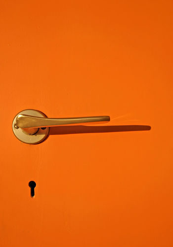 Close-up of handle and keyhole on door
