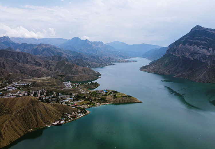 Dagestan, irganay reservoir and the village of shamilkala against the backdrop of mountains