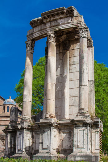Ruins of the ancient temple of vesta at the roman forum in rome
