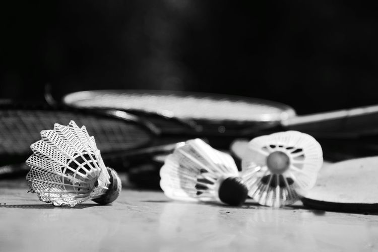 Close-up of shuttlecock on table