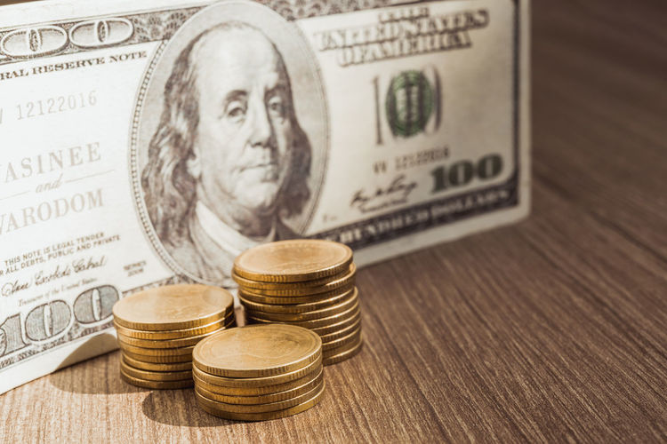 Close-up of coins on table