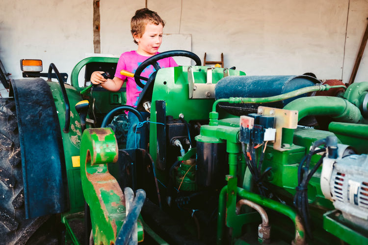 Boy playing with toy toys