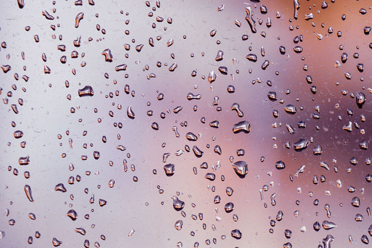Raindrops on the window in rainy days