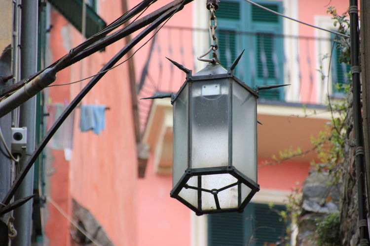 Close-up of window hanging on building