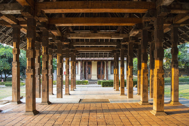 Wooden pillar's at the temple of the holy tooth relic in sri lanka