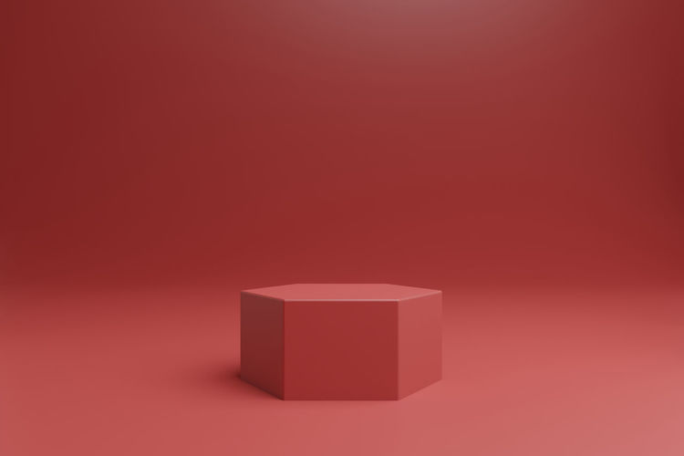 Close-up of toy blocks against red background