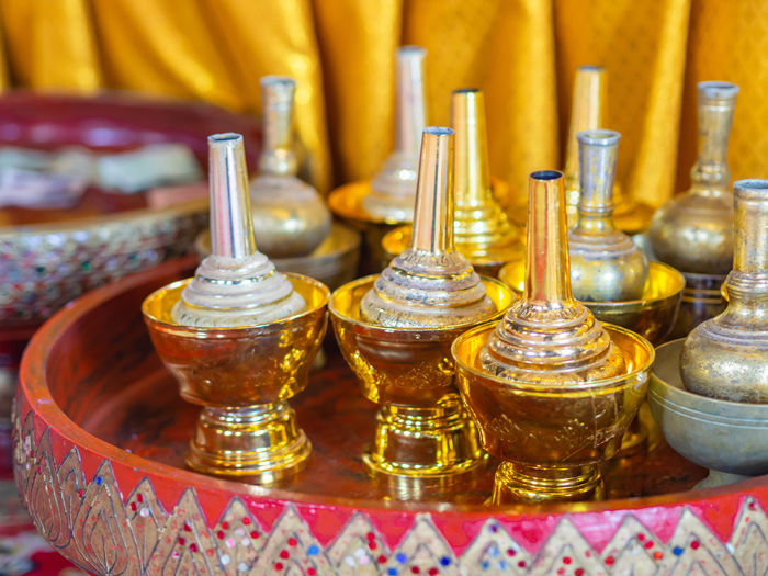 Group of bottles using for pouring water dedicating to people who passed away in buddhism.