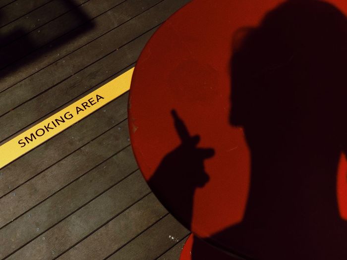Shadow of man on table