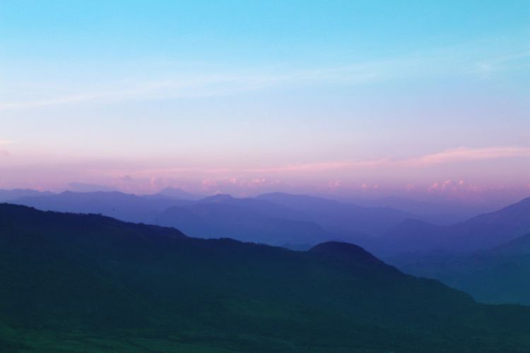 Scenic view of mountains at sunset