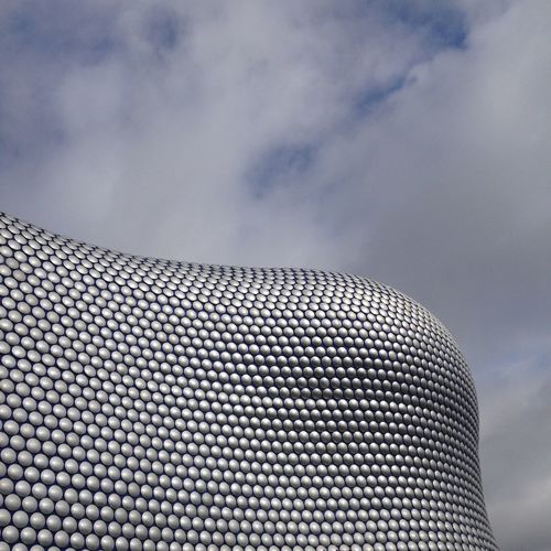 Low angle view of modern building against sky
