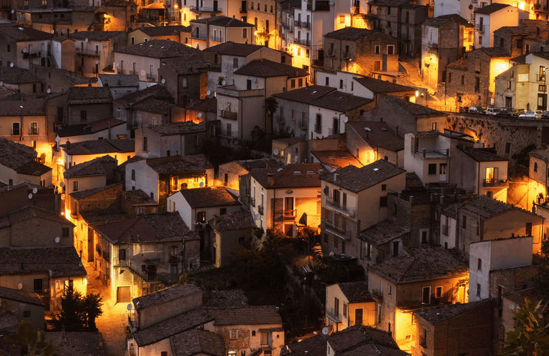 High angle view of illuminated buildings in town