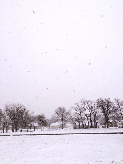 Scenic view of snow covered field
