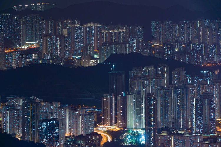 Illuminated buildings in city at night