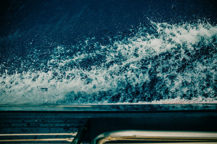 Scenic view of sea seen through car window
