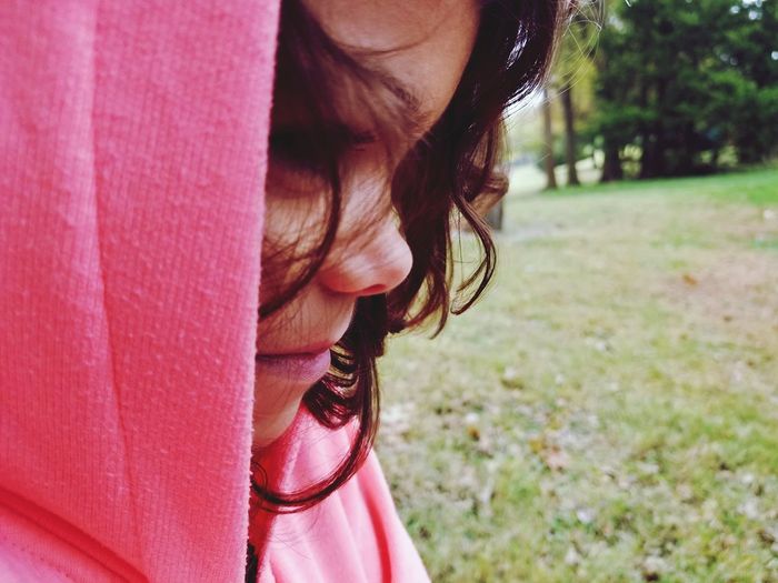 Close-up of girl with hooded shirt