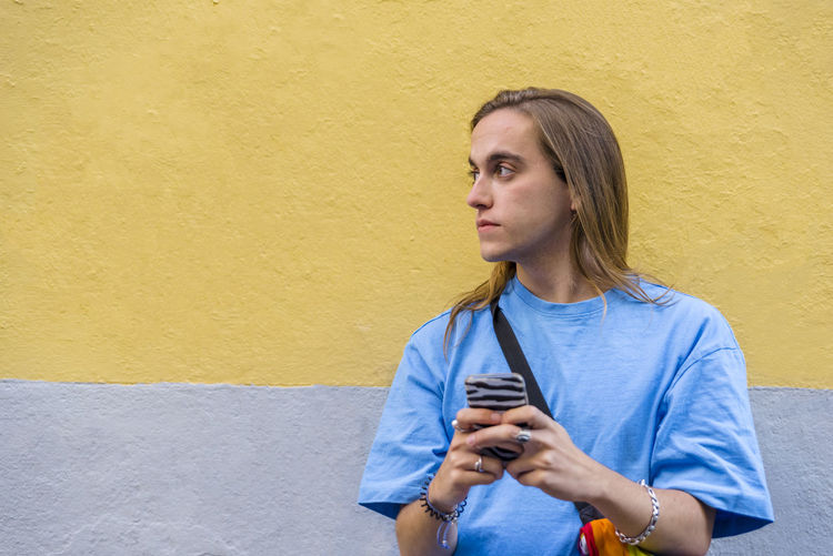 Young woman using mobile phone