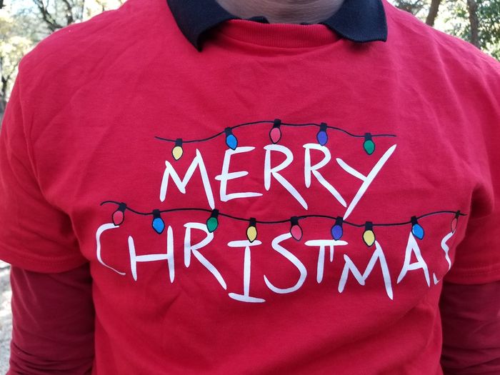 Rear view of man with text