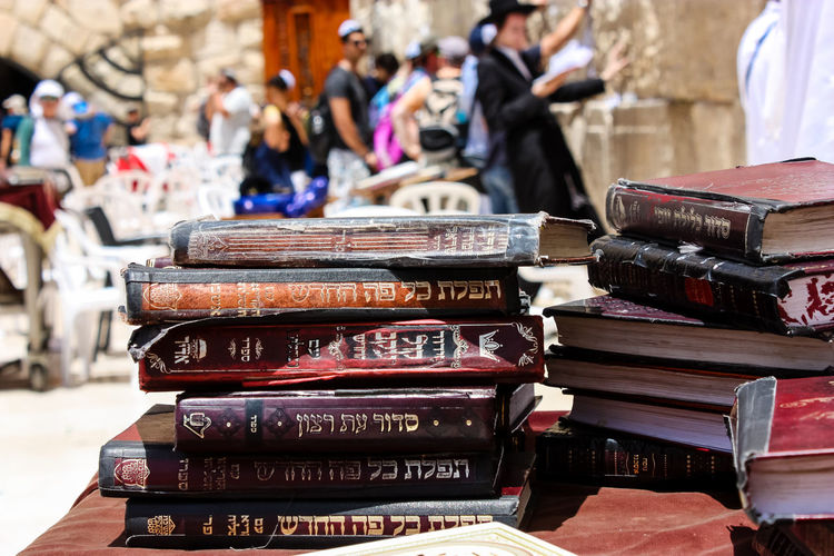 Stack of holy books on table