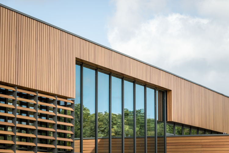Low angle view of modern building against sky