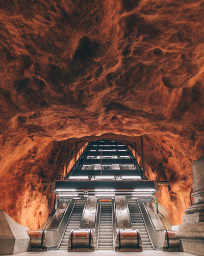 Illuminated escalators in cave