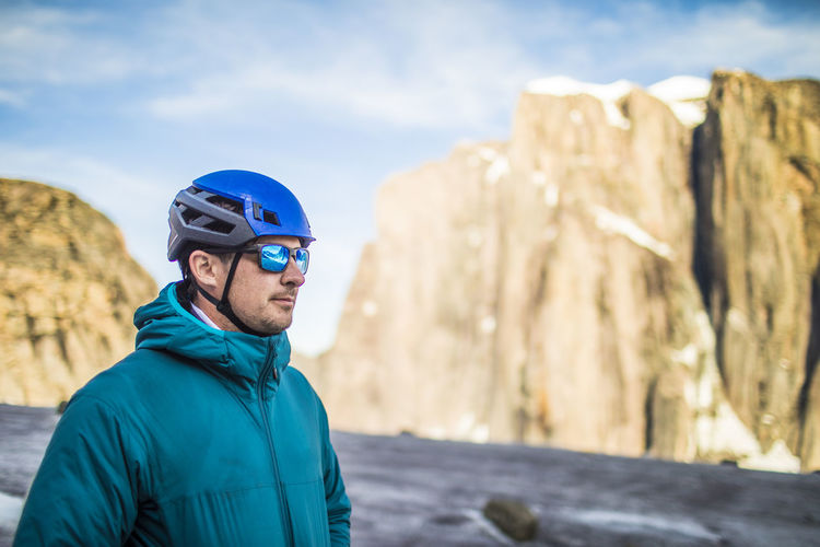 Portrait of climber in mountains wearing blue.